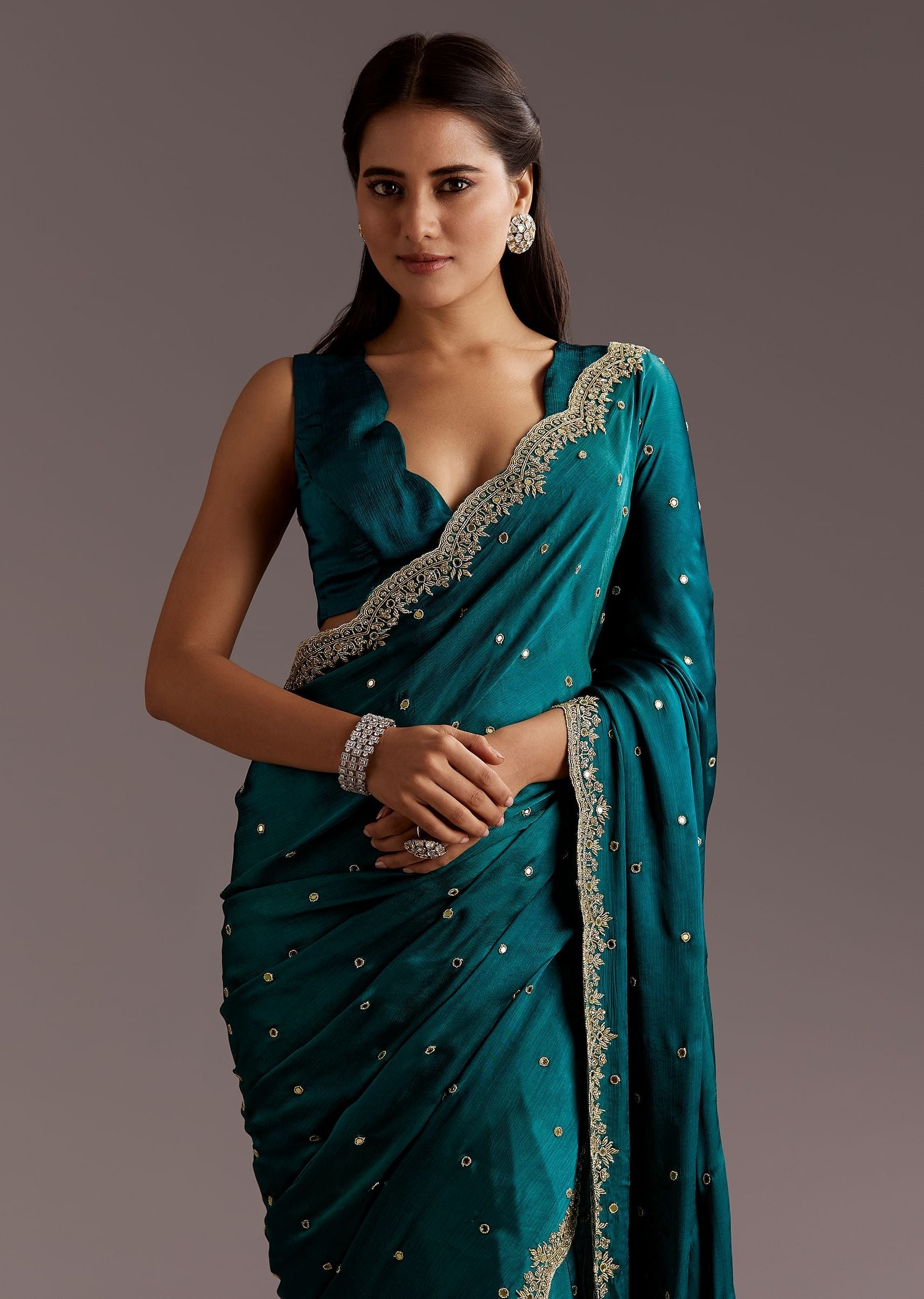teal-green-chinon-saree-with-cutdana-and-sequins-scallop-border-sg285853-2_9a297e35-e103-4a56-82e4-082371435046.jpg