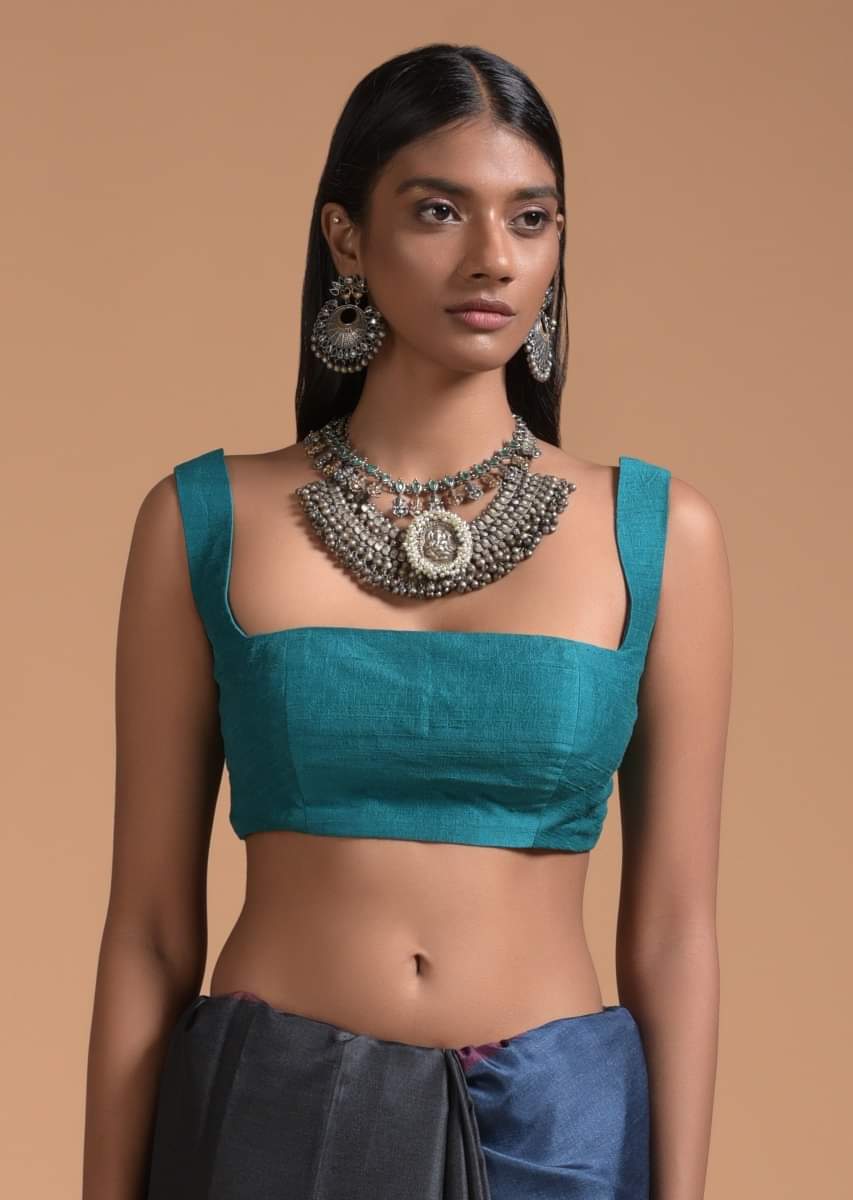 teal_blue_sleeveless_blouse_in_raw_silk_with_fancy_curvy_square_neckline_online_-_kalki_fashion_1_19ff1a7b-a8be-49ed-85ca-e0f41222fb29.jpg