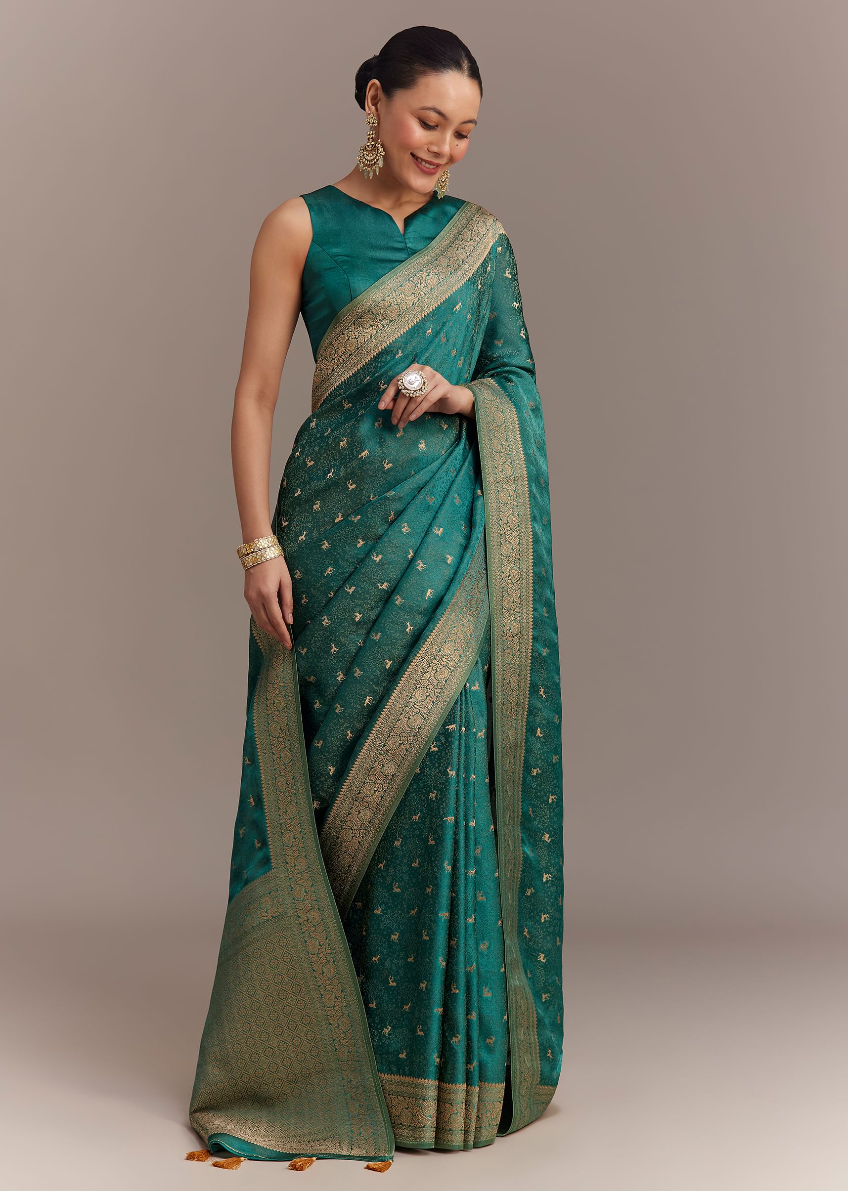 teal_green_tissue_silk_saree_with_zari_border-sg276497_1_20f5cdf4-fd58-4e52-a269-8260209444a8.jpg