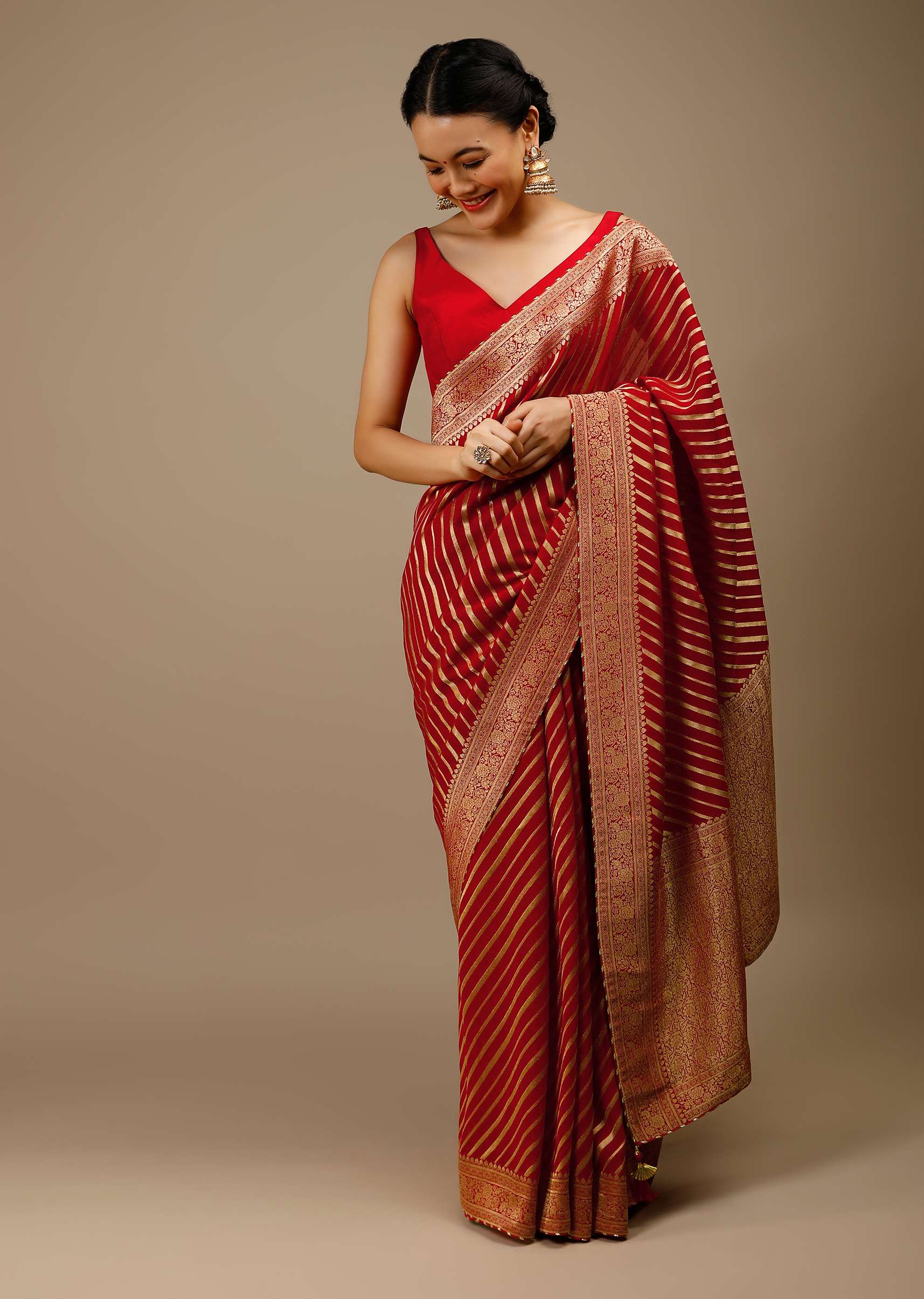 tomato-red-saree-in-georgette-with-brocade-woven-diagonal-stripes-and-floral-border-online-kalki-fashion-j004pf1081y-sg70051_2_85f13c0c-5e54-4fbd-8a23-24b1bcdb963c.jpg