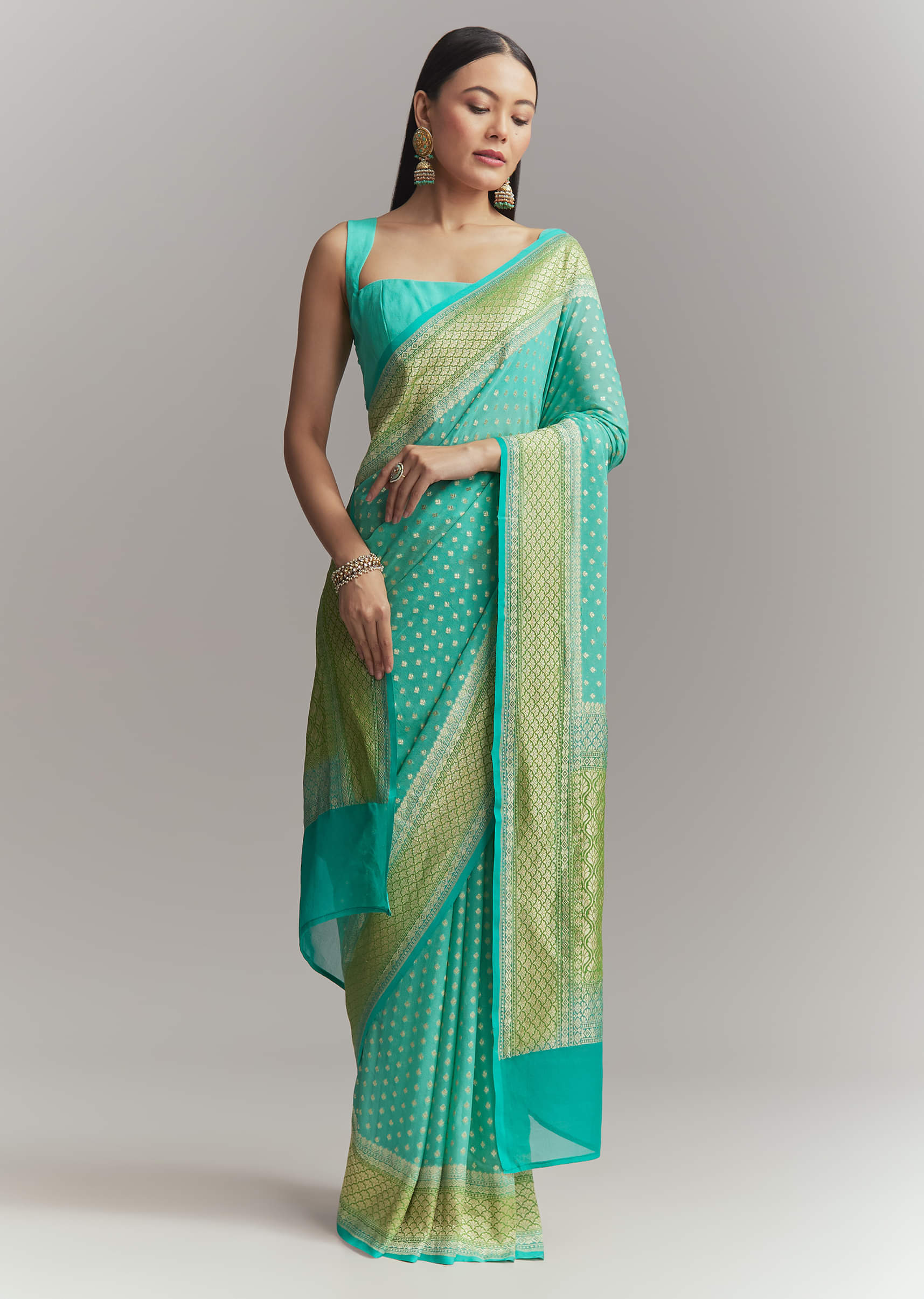 turquoise-georgette-woven-saree-with-parrot-green-contrast-work-sg342148-1_ca4b626f-b030-4f25-a121-ca4e546ba454.jpg