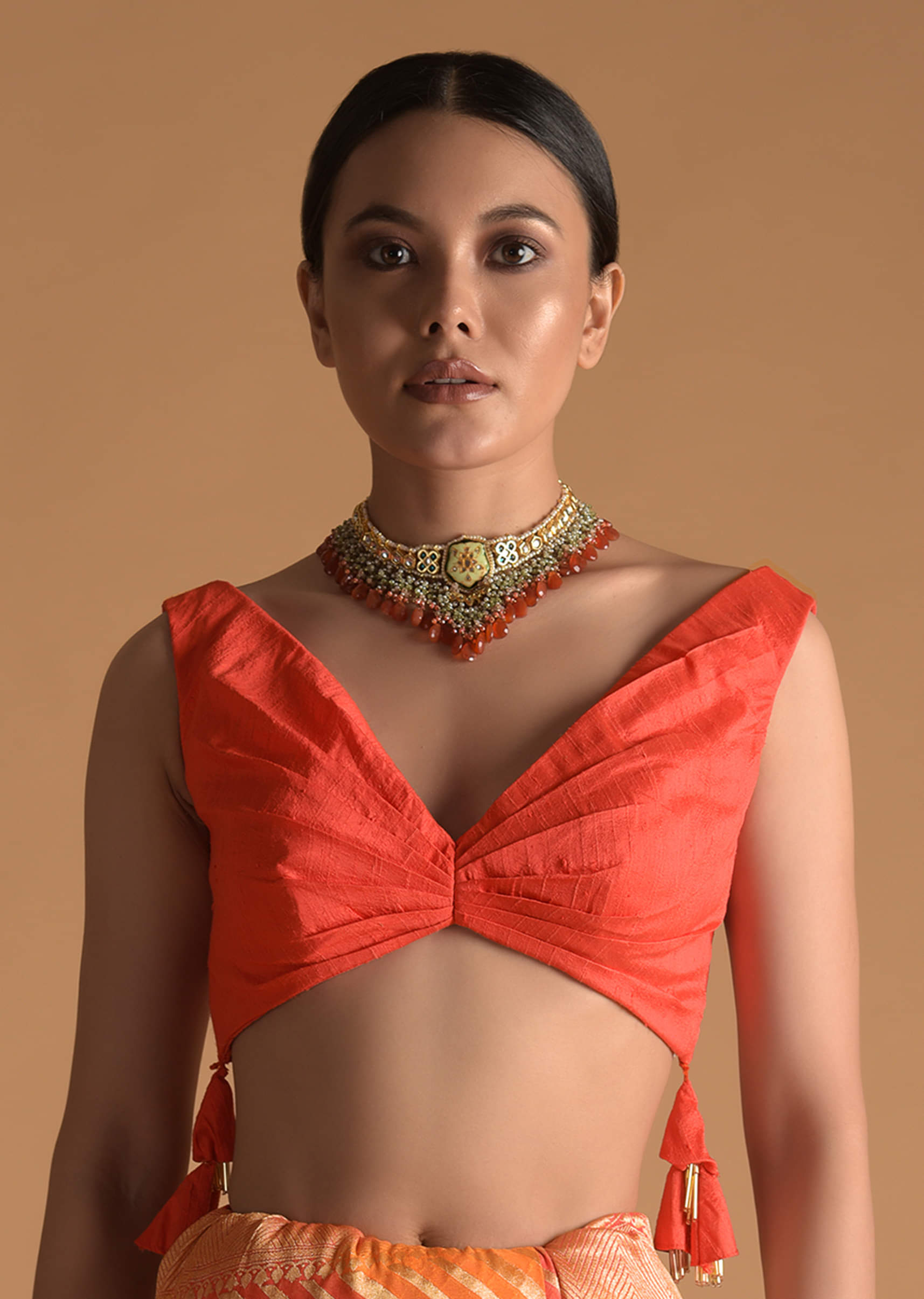 vermillion_orange_blouse_in_raw_silk_with_pleat_details_on_the_front_and_back_along_with_tassels_on_the_sides_online_-_kalki_fashion_3_aa8781db-affd-4b2e-b014-3e0d702bb612.jpg