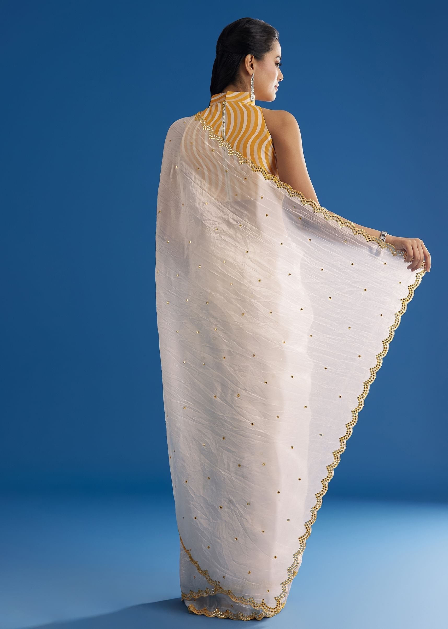 white-crepe-silk-saree-with-mirror-scallop-contrast-border-and-yellow-blouse-sg299436-4_d8fc956a-3d37-4a5d-9965-1427d66d0988.jpg