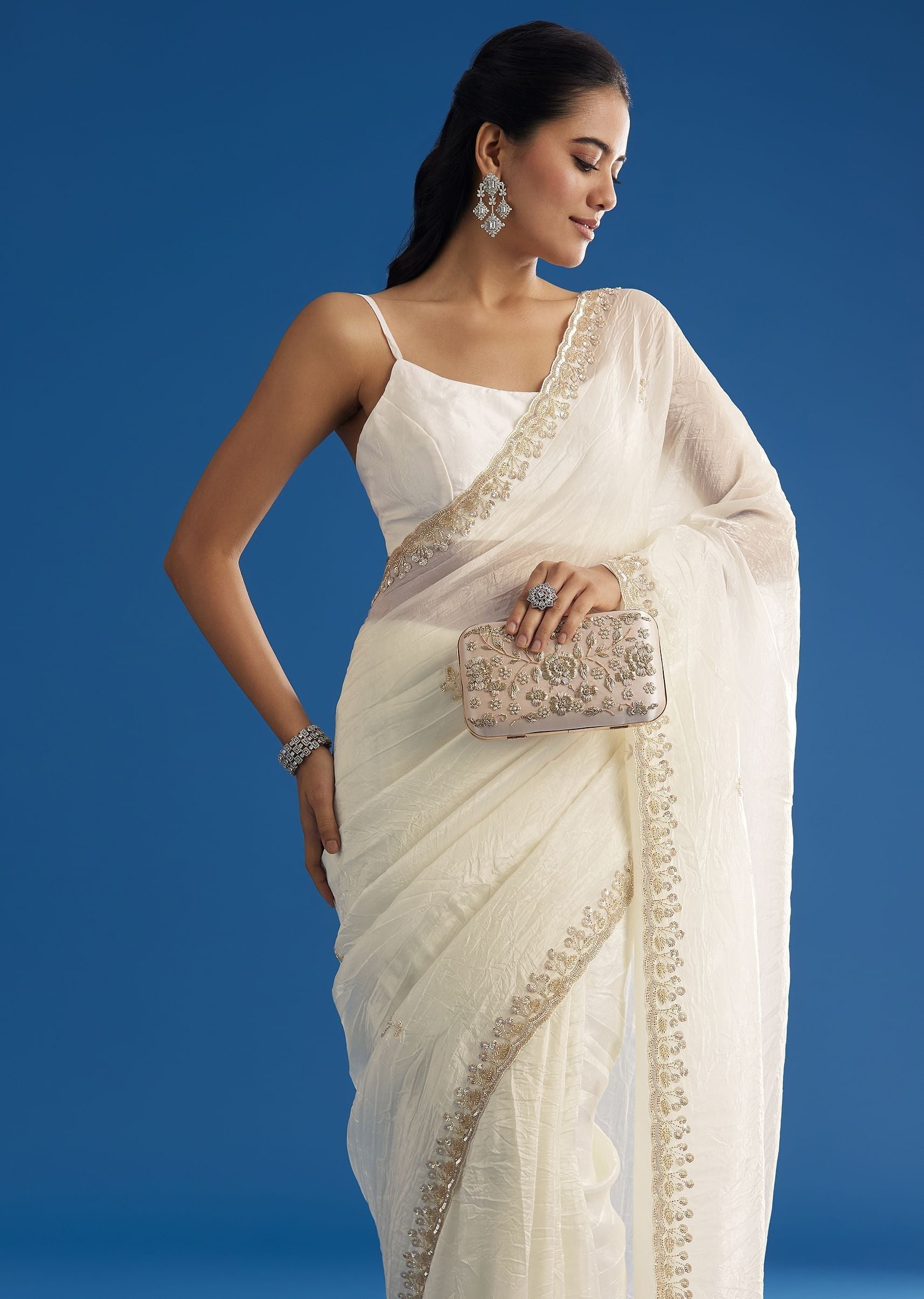 white-crushed-tissue-saree-with-stones-and-sequins-embroidery-and-scallop-border-sg296145-1_6995dc06-c2df-4093-b0d0-3eed0006324a.jpg