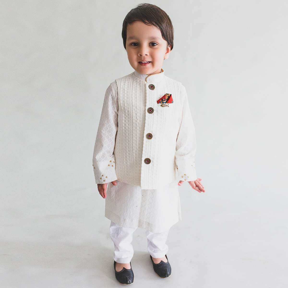 white-jacquard-bundi-and-kurta-set-with-embroidered-sleeves-by-tiber-taber-sg45670_f41ac2d2-4dc4-4e0e-9074-d16cc595a642.jpg