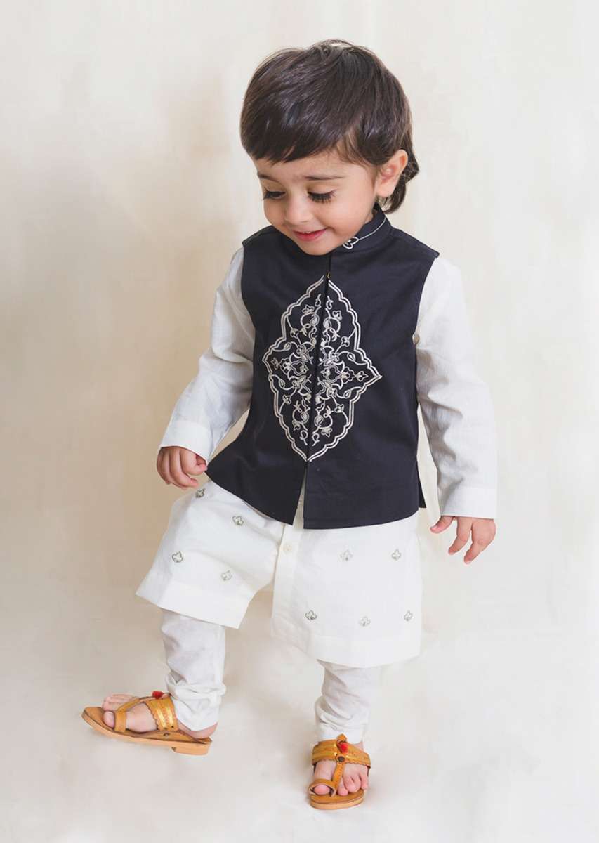 white-kurta-set-with-embroidered-buttis-and-black-nehru-jacket-with-ornate-embroidered-motif-by-tiber-taber-d067tt2011043y-sg54484_4_5d1468b2-c5d6-4abf-adc1-7bca82a7f3a1.jpg