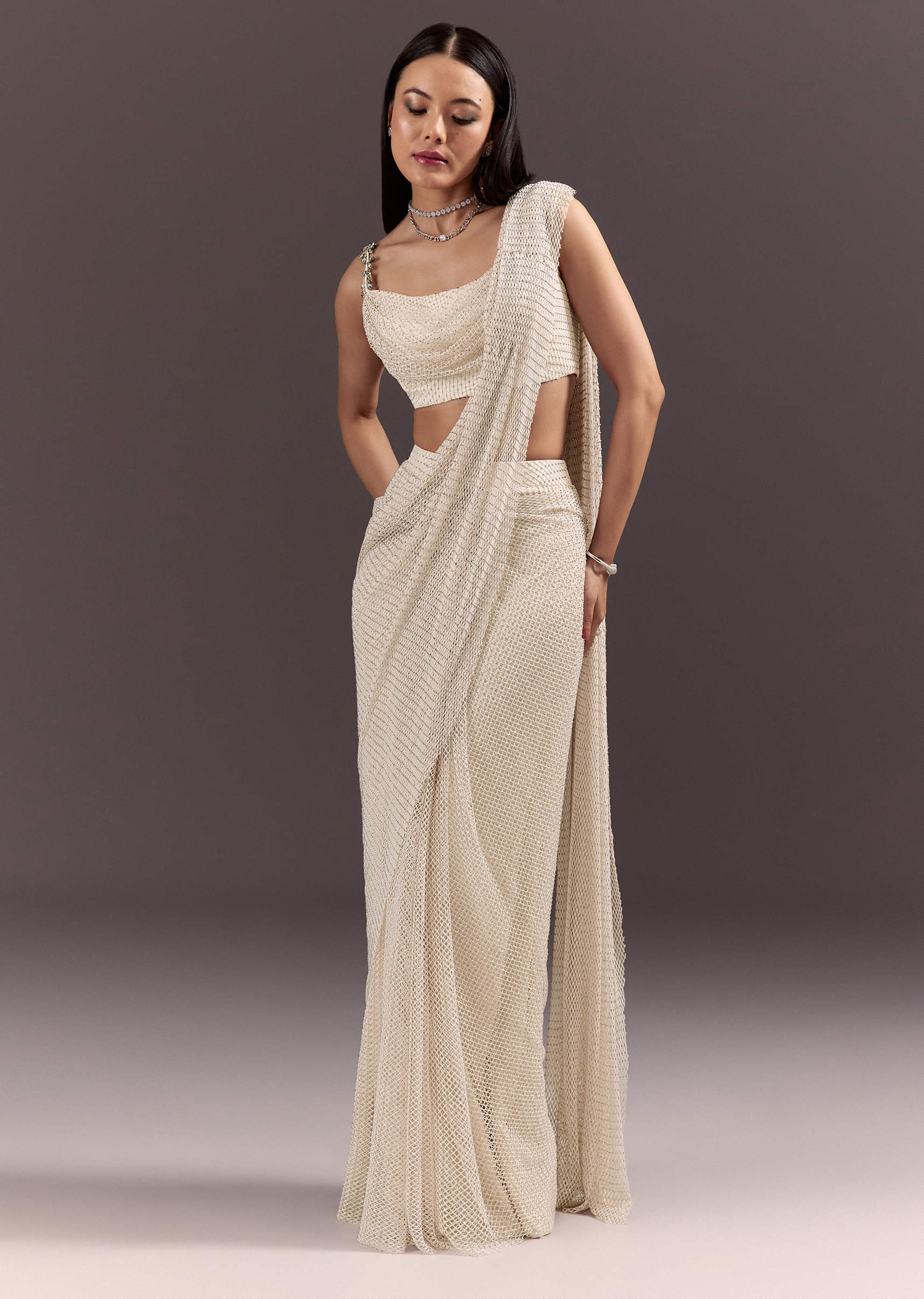 white-pre-draped-saree-with-crystal-work-and-cowl-blouse-sg321058-2_d7f73b5d-622a-48e6-b8c9-99252fa16b49.jpg