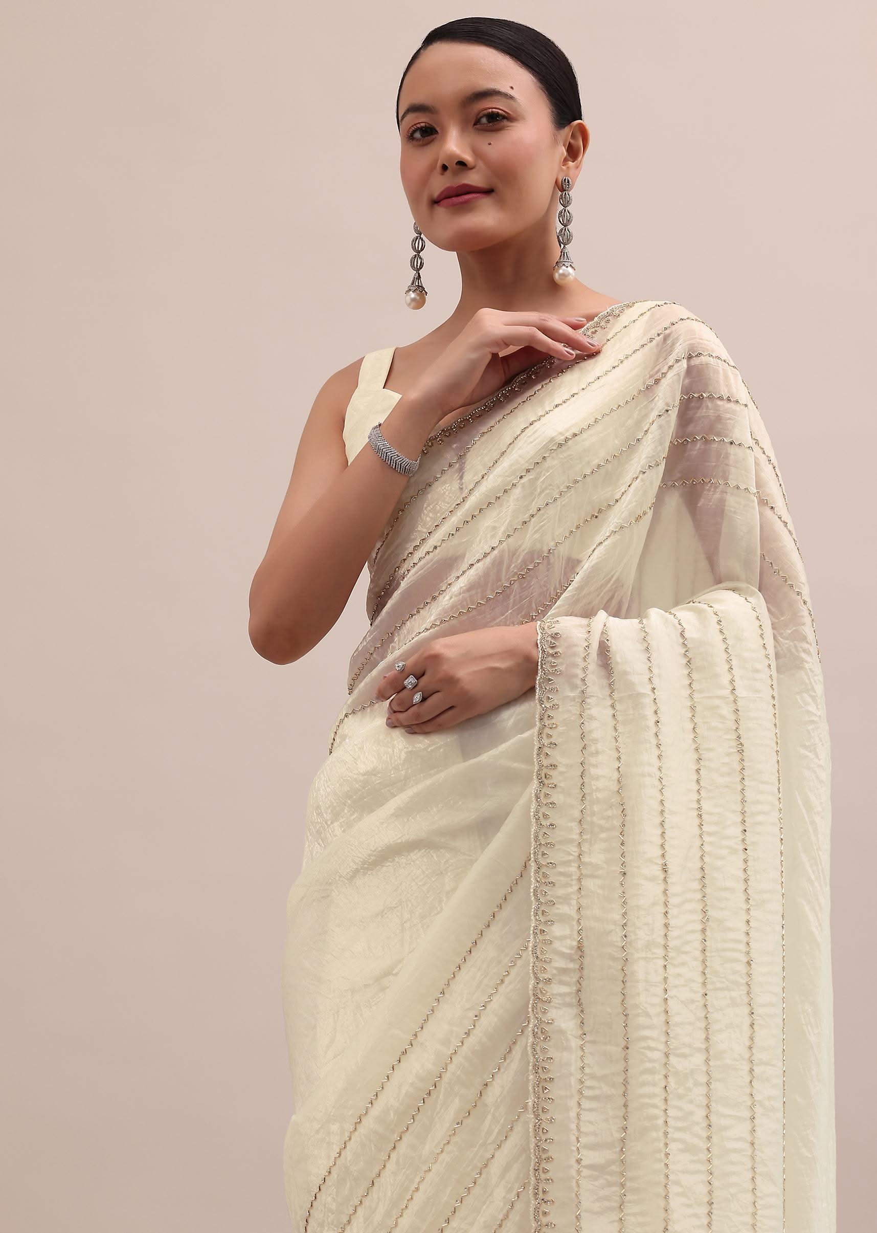 white_embroidered_tissue_saree_with_unstitched_blouse-sg213869_11_d671d9cd-3bd0-4b34-9967-c4ae6a79fa30.jpg
