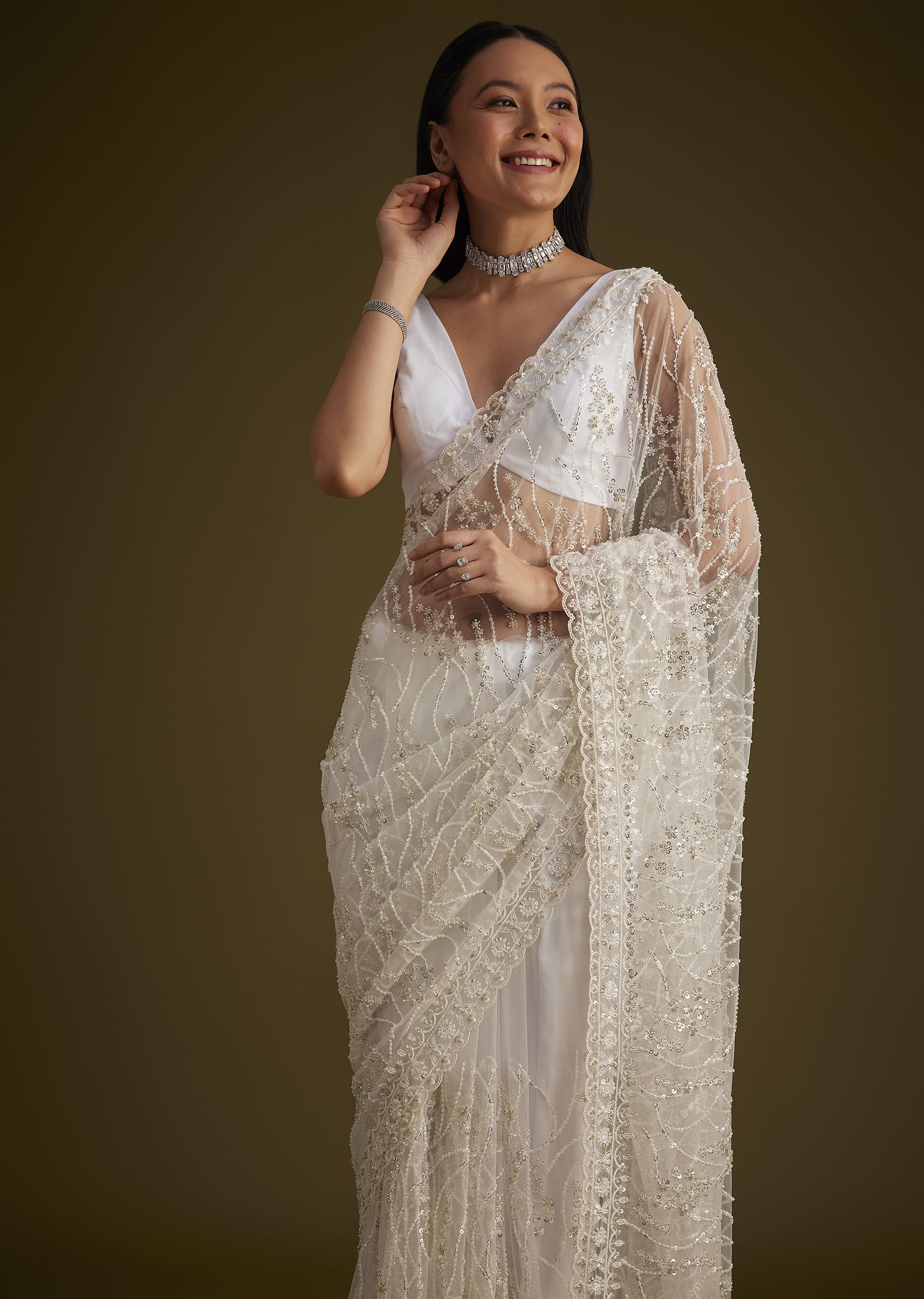 white_net_saree_with_sequins_and_stones_embroidery-sg261875_13_89cfbc6e-5d93-45e0-b339-f142a98d9750.jpg