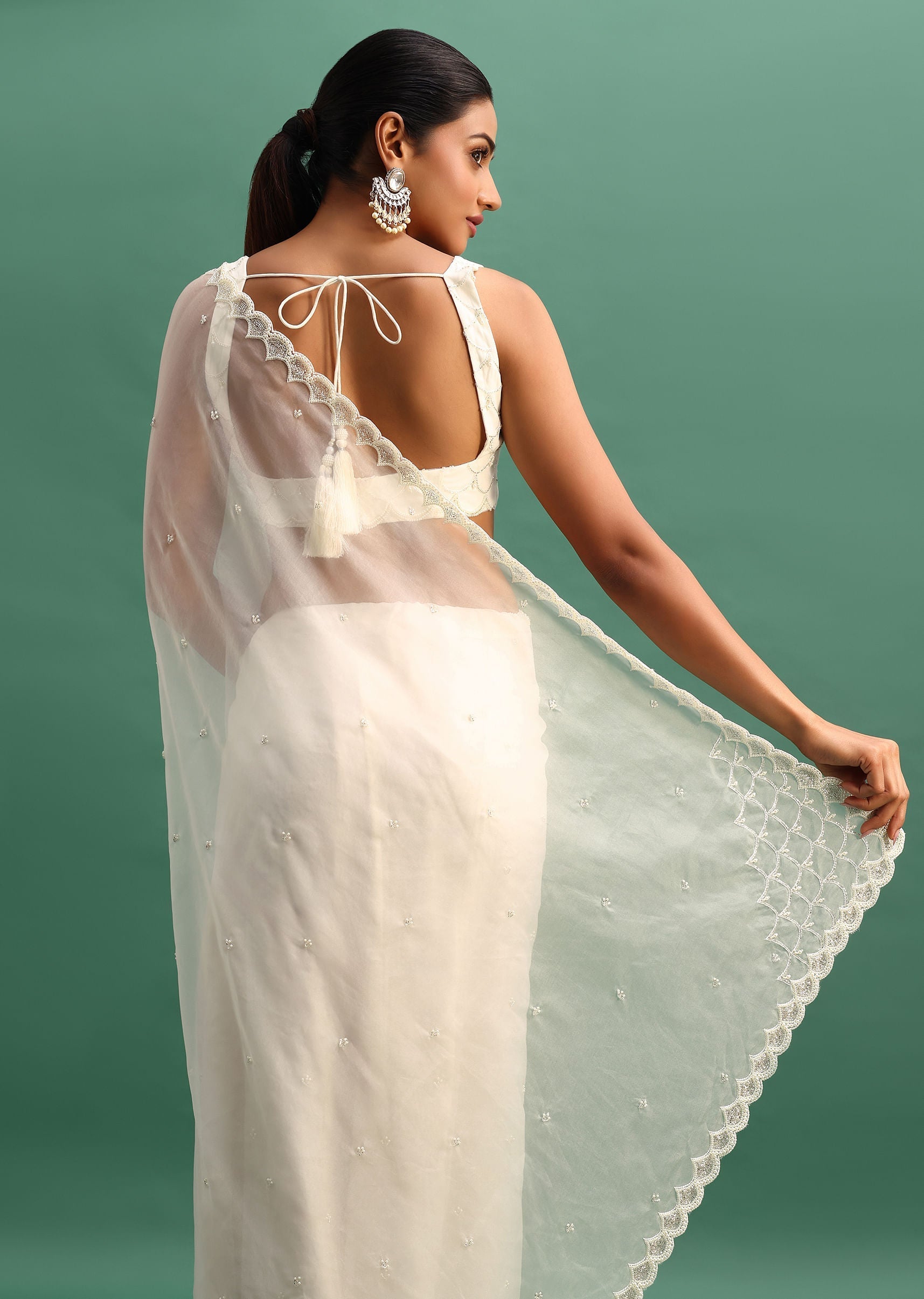 white_organza_saree_with_beads_and_cutdana_embroidery_and_un-sg224700_4_e28c8eb0-79d7-4a98-8c62-d7b0fd142eea.jpg