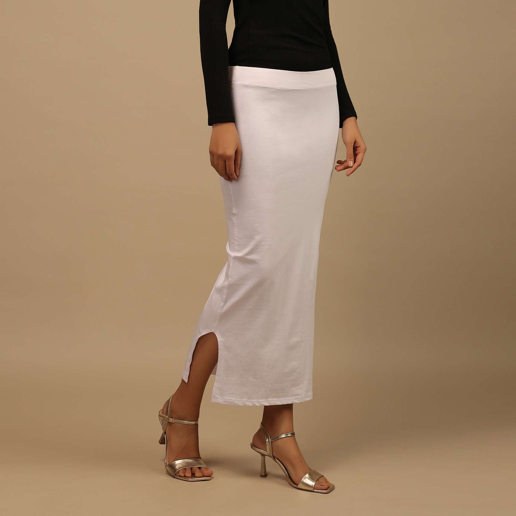 white_shapewear_saree_petticoat_in_cotton_lycra_with_elastic_waistband_and_slit_3_69a107c1-8660-4635-be1d-cb1e71730554.jpg