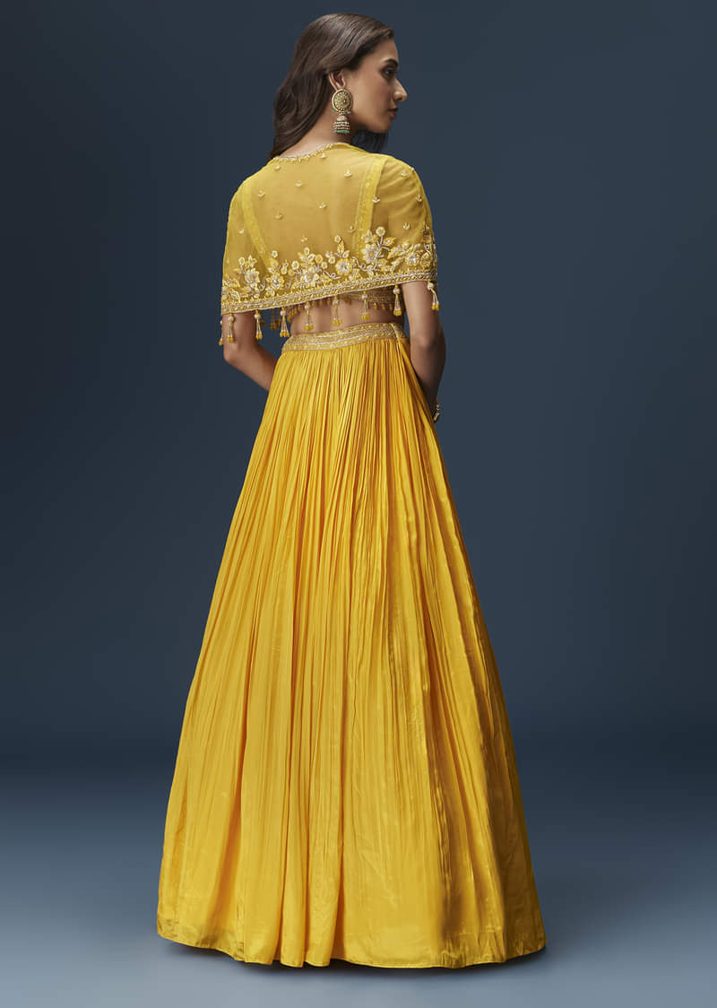 yellow-bridesmaid-lehenga-with-sleeveless-blouse-and-draped-cape-sg334681-2_5edf3fd3-6b39-432c-9184-efedd2c9f74f.jpg