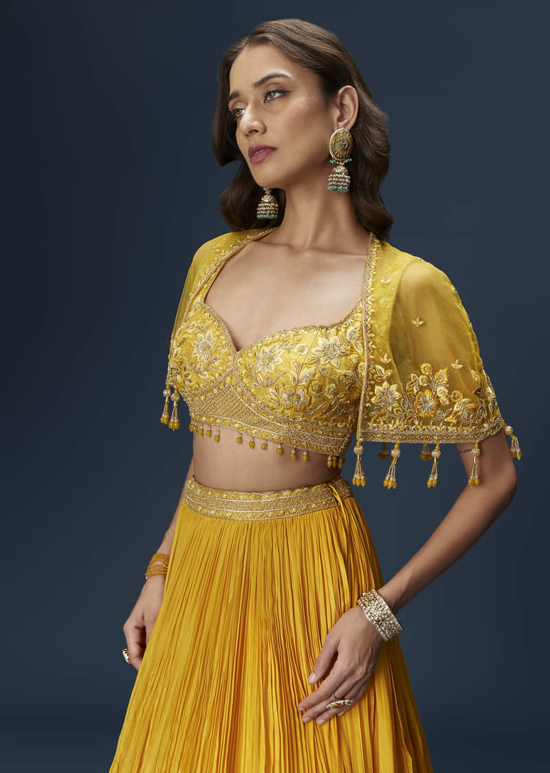 yellow-bridesmaid-lehenga-with-sleeveless-blouse-and-draped-cape-sg334681-5_a4c05d52-5cd0-4c90-bf7c-48159a8cc1f5.jpg
