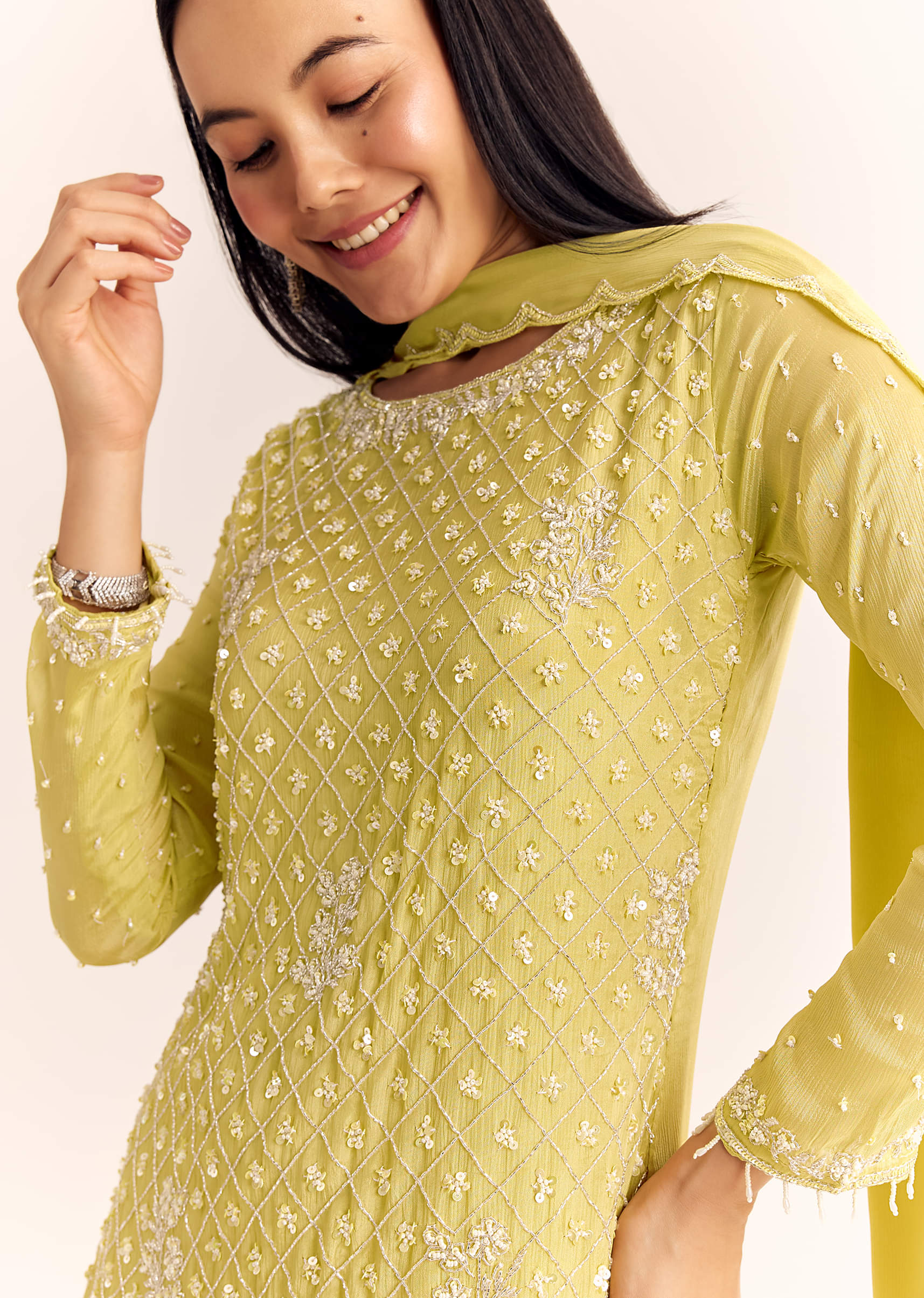 yellow-chinon-sharara-dupatta-suit-with-cutdana-moti-and-sequins-sg317113-3_de0865a8-efb5-43d9-90d5-4fa6bb7425a6.jpg