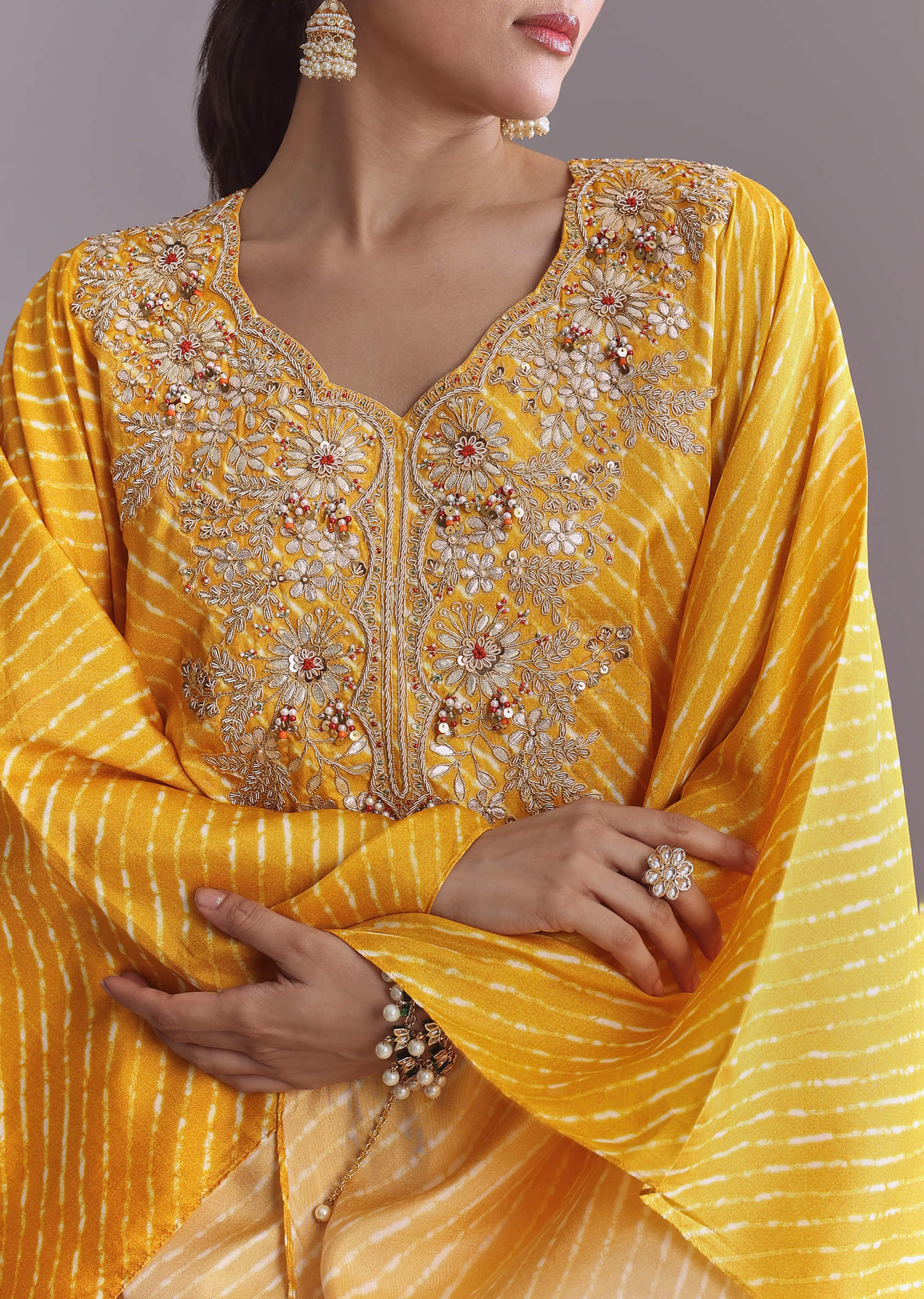yellow-silk-kaftan-top-and-drape-skirt-set-with-leheriya-print-sg319255-2.jpg