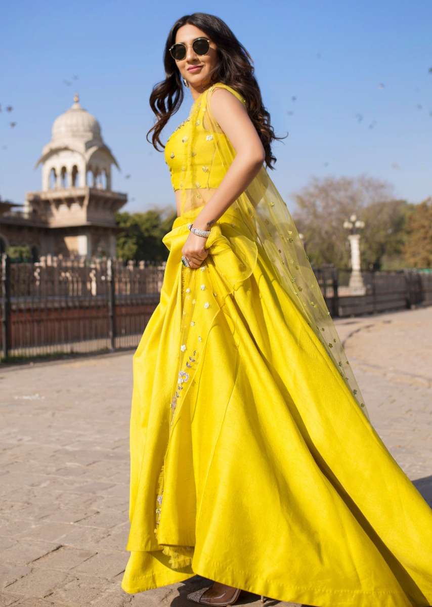 yellow-tussar-silk-lehenga-and-crop-top-with-matching-embroidered-net-jacket-only-on-kalki-477397_2_80551500-4401-4726-9ea5-84b162f5df8a.jpg