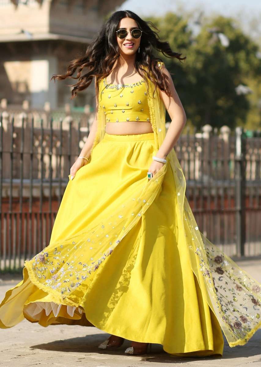 yellow-tussar-silk-lehenga-and-crop-top-with-matching-embroidered-net-jacket-only-on-kalki-477397_9_eb9e7490-9c74-45a1-bf89-fe9fe99c5c21.jpg